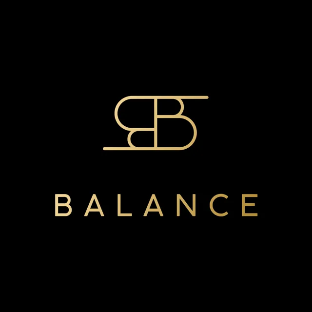 Logo-ul Balance — monogramă aurie pe fundal negru